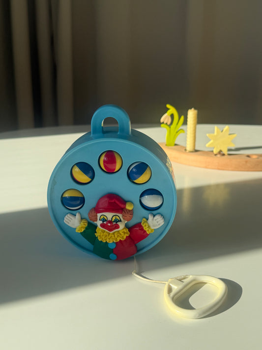 Klovn spilledåse med snor