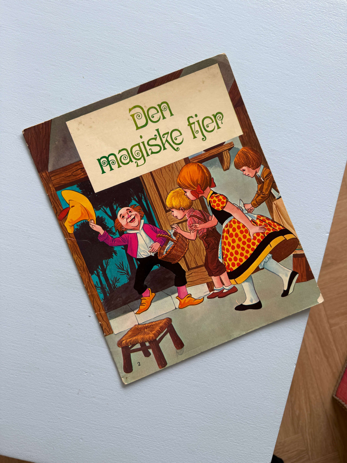 Den magiske fjer bog