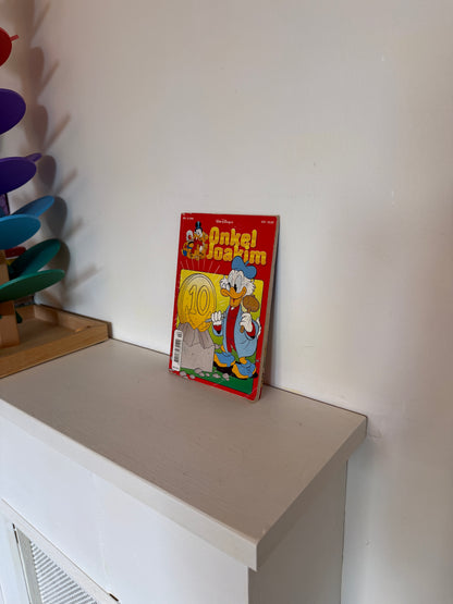 Onkel Joakim bog i rødt bind
