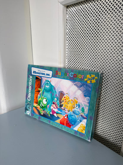 Monsters Inc 2-i-1 puslespil med 20 brikker