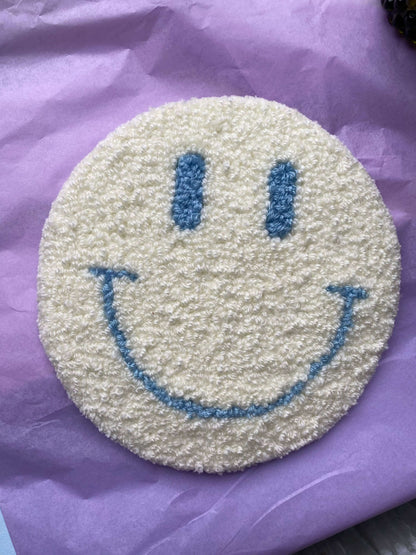 hvid smiley vægtæppe